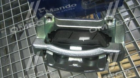 Купить Тормозной суппорт KIA Sorento, Hyundai Santa Fe MANDO ex581102b700 (фото1) подбор по VIN коду, цена 5096 грн.