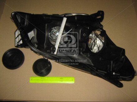 Фара левая с моторчиком Opel Astra H (07-) H1/H7 TYC 20B208052B
